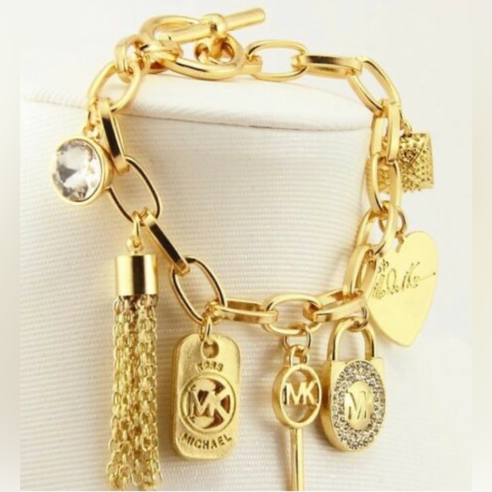 MK  replica Michael Kors Charms Bracelet Bangle, Gold Tone Key With toggle clasp